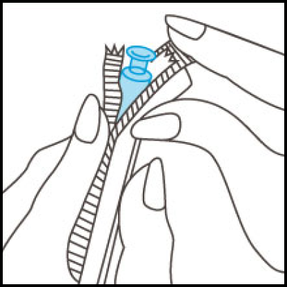 Separating the plastic wrap and removing the applicator