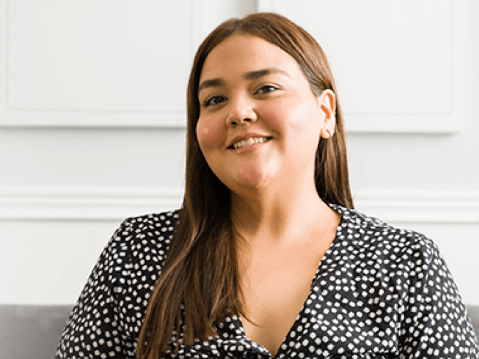 Woman sitting on couch