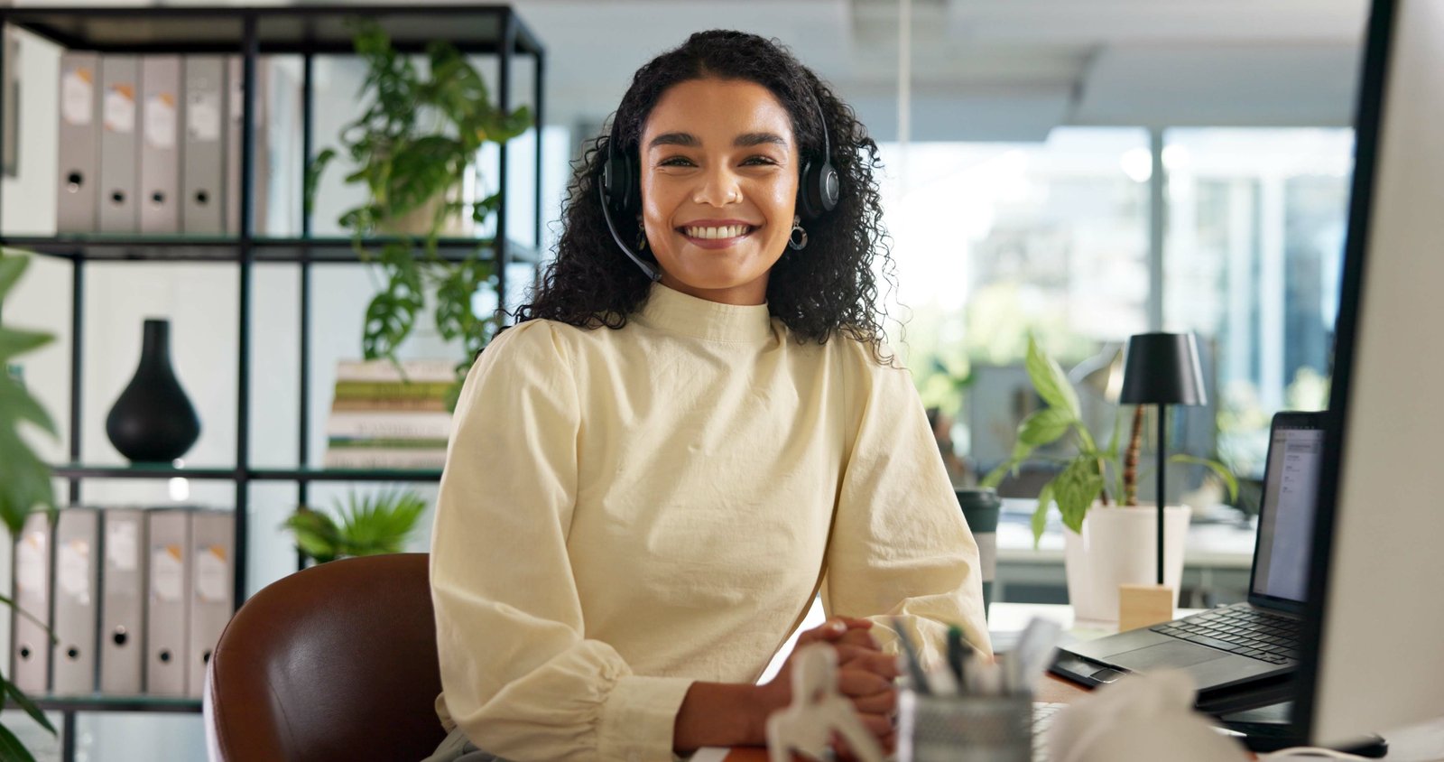 Call center, happy woman and customer service in portrait with confidence, communication and online consulting. Proud, virtual chat or smile for contact support, help desk or sales agent for business.