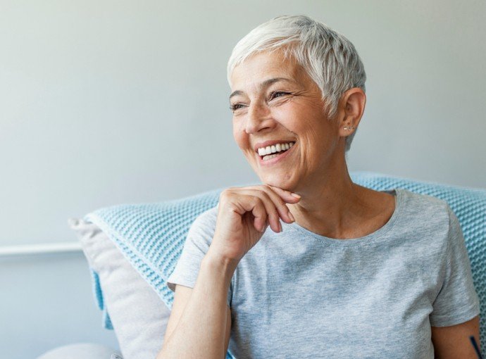 Older woman sitting on couch